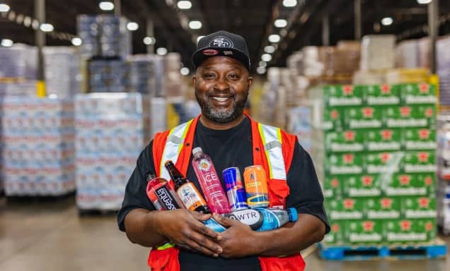 distribution employee holding non-alcoholic beverages